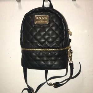 Black mini backpack.